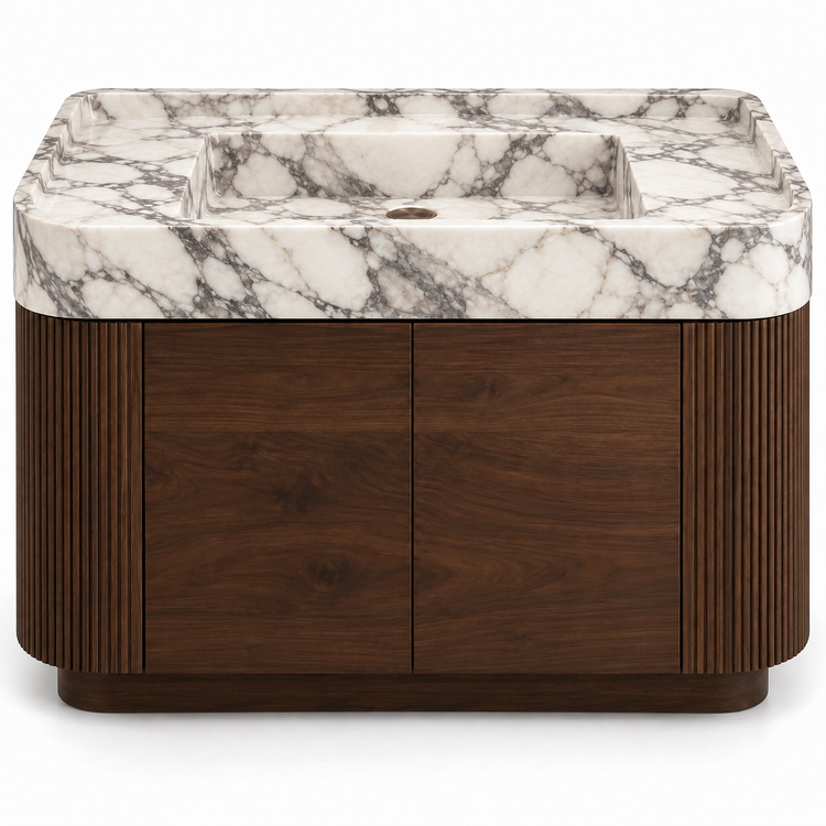 Arabescato integrated sink with curved dark walnut vanity and fluted sides, front view