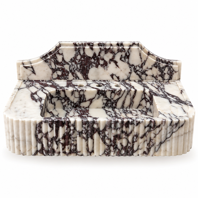 Calacatta Viola natural marble fluted sink with sculpted arched backsplash and integrated basin, white background