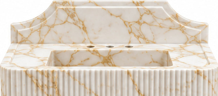 Fluted Calacatta Gold Marble Console Sink with Brass Legs and Arched Backsplash - basin and stone apron detail