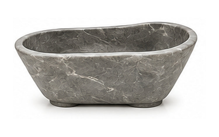 Concept image of a sculptural freestanding bathtub in Italian Grey natural stone, Vero Marble