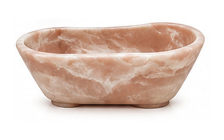 Concept image of a sculptural freestanding bathtub in Pink Onyx natural stone, Vero Marble